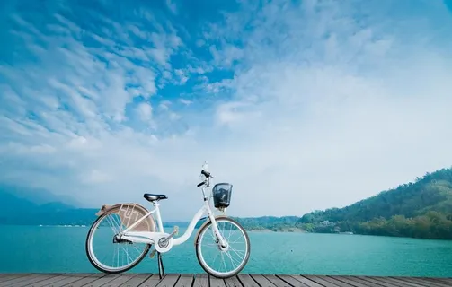 海边自行车旅游背景海报素材图片 海边自行车旅游背景海报素材图片