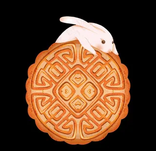 中秋节趴在月饼上的兔子图片