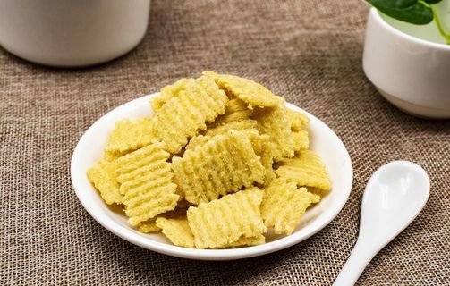 小米锅巴零食食材背景海报素材图片