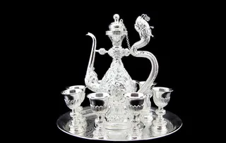 银器九龙壶图片