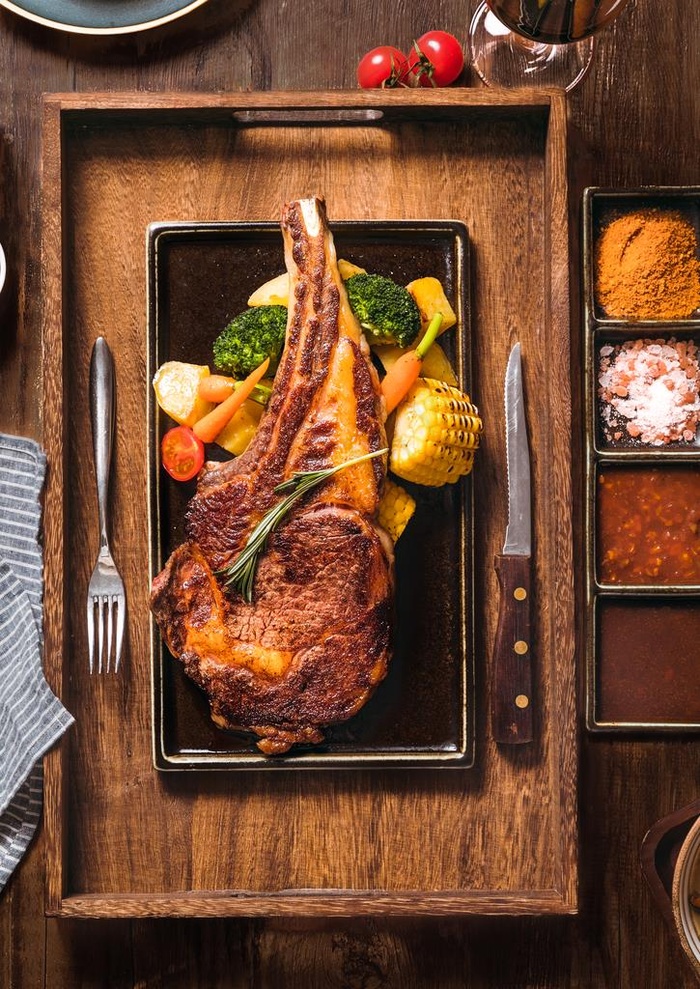 战斧牛排美食食材背景素材图片