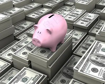 美元钞票与储蓄罐