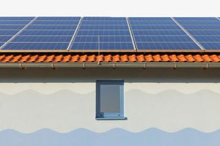 手绘蓝色光伏发电板屋顶免抠