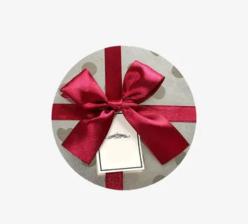 圆形红色彩带装饰礼盒盖子平面俯免抠