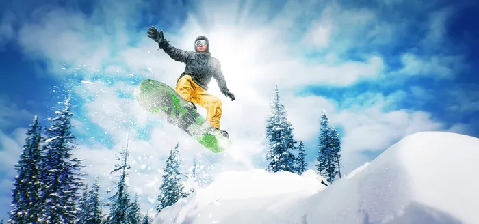 山顶上冲出的滑雪运动人物高清图片高清