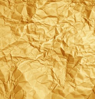 金色皱巴巴的纸张背景 金色皱巴巴的纸张背景