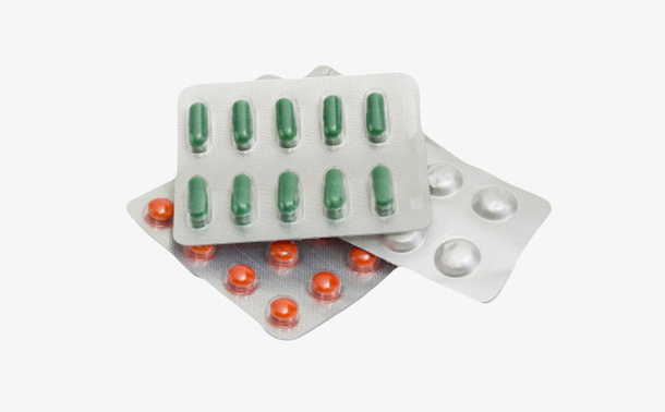 红绿白色治愈包装盒里的西药片实免抠