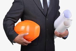 建筑师拿着头盔图纸免抠