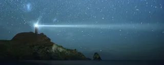 星空灯塔背景高清