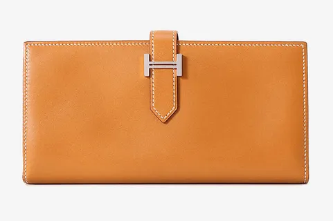 爱马仕橙色小手包免抠