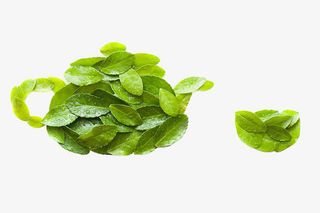 茶叶摆成的茶壶和茶杯的图案免抠