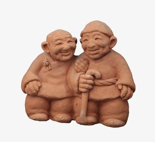 泥塑相扶的老人免抠