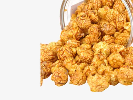 玻璃罐中散落出来的球形爆米花免抠