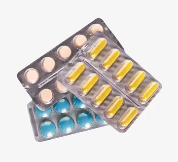 黄蓝粉红色治愈包装盒里的西药片免抠