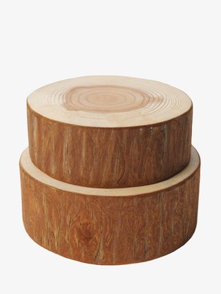 红色皮质堆叠一起的木头截面实物免抠