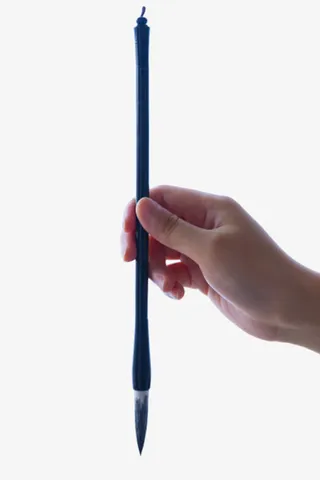 实物手握毛笔笔头免抠