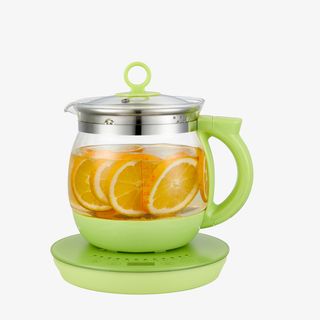 煮橙子水的养生壶实物图素材免抠