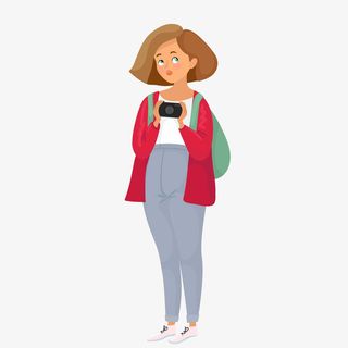 拿着相机的卡通女生免抠