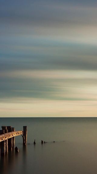 棕色栈桥海景图片背景高清