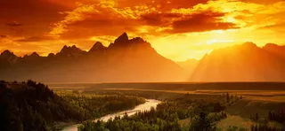 夕阳高山背景海报高清