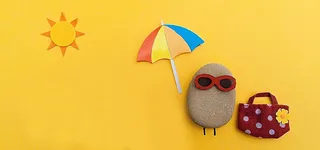 黄色底纹卡通石头背景高清