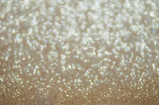 金色粒子光斑背景