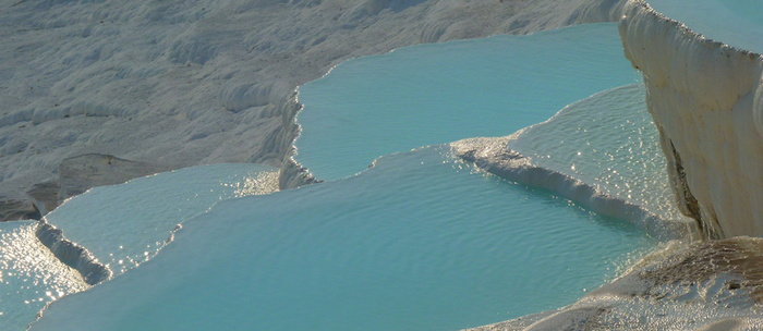 阳光岩石水纹背景图高清