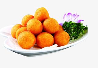 金黄色兰花装饰盘装炸丸子免抠