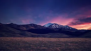 蓝天粉色云彩山峰草地免抠