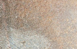 黄白色点状铸铁钢材锈蚀底纹背景