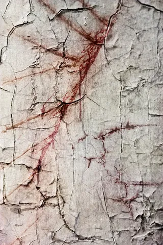 布满裂纹的白色墙壁背景