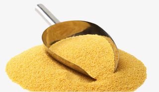 铁铲子在小米粒堆上免抠