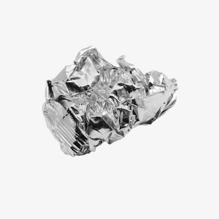 揉成一团的银色锡纸免抠