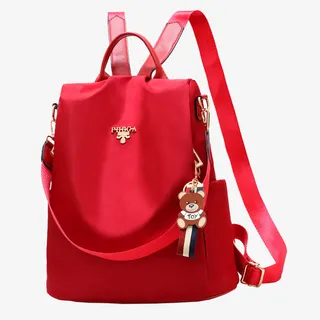 红色时尚青年背包免抠