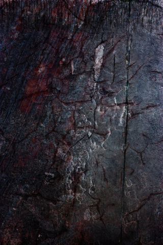 黑色石头裂纹海报背景