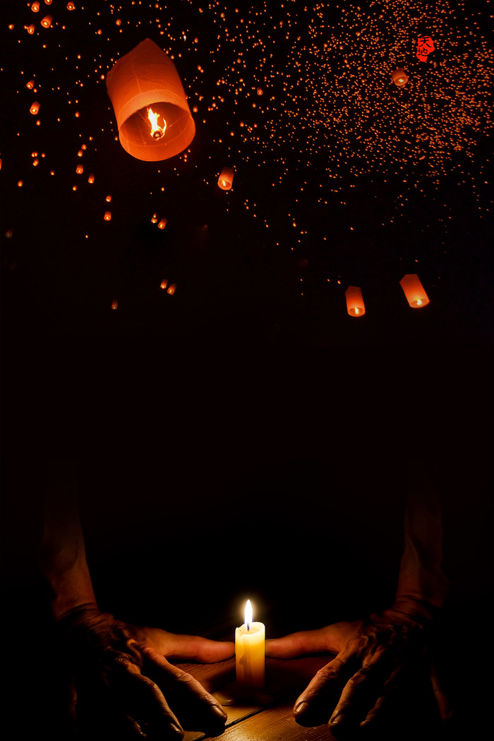 点蜡烛抗震救灾黑色背景高清