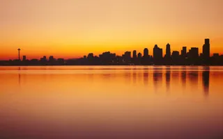 日落水边城市海报背景