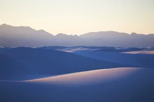 蓝色沙漠起伏海报背景