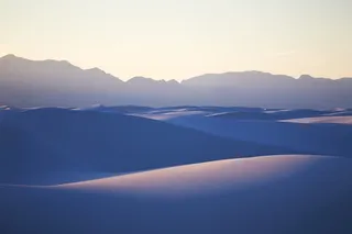 蓝色沙漠起伏海报背景