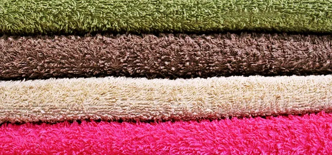 彩色纺织品叠放背景高清