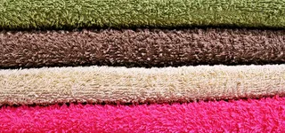 彩色纺织品叠放背景高清