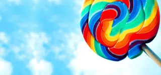 七彩棒棒糖蓝天背景高清