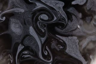 黑色白色颜料混合背景