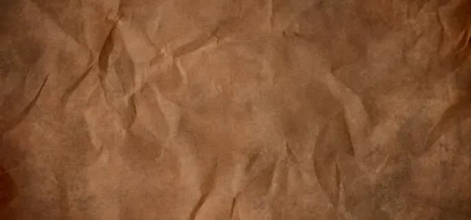 深棕色牛皮纸褶皱纹理背景 深棕色牛皮纸褶皱纹理背景