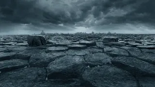 黑色乌云下开裂的石头免抠