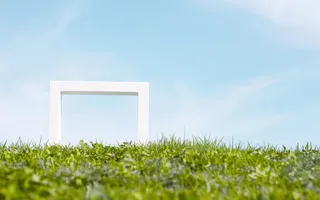 景深效果草地白色规则形状蓝天背景