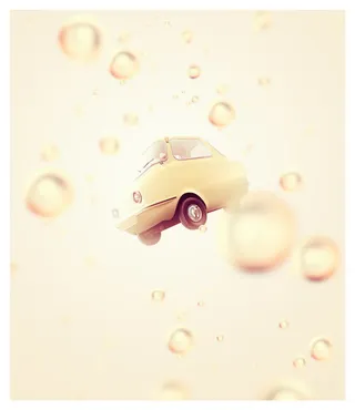 黄色底纹里的黄色水滴与汽车免抠