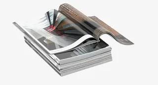 一摞摊开翻页时尚杂志书免抠