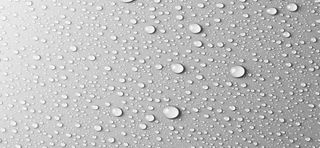 灰色玻璃上的水滴质感背景高清