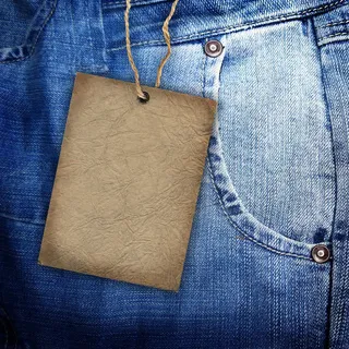 吊卡与牛仔裤背景